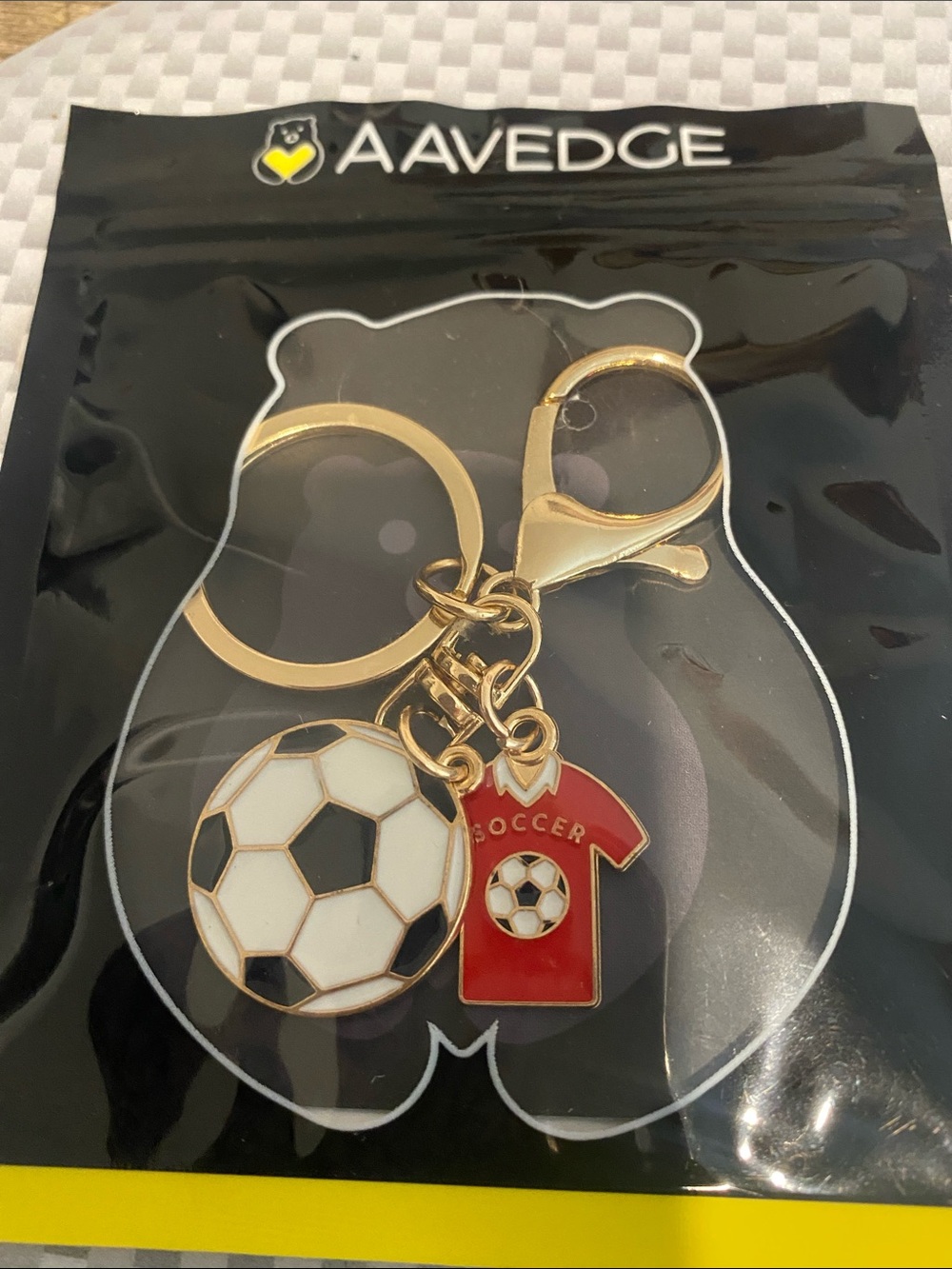Newedge Gold-Tone Keychain with Red Jersey and Black-and-White Soccer Ball Charm